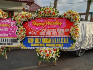 Karangan bunga happy wedding dan selamat dan sukses - toko bunga kuningan